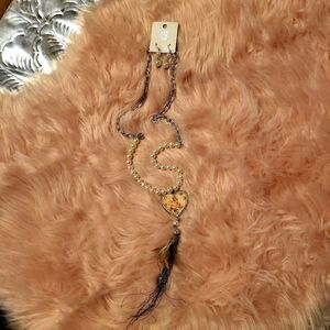 A set of earrings and a necklace,  very nostalgic and boots, brand new!